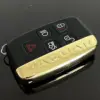 1x NEU JAGUAR Schlüsselgehäuse 4 Tasten GOLD Metall Kunststoff schwarz mit Logo Emblem