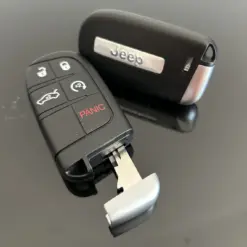 1x NEU Jeep Chrysler Schlüsselgehäuse LIMITED 5 Tasten schwarz mit Logo Emblem
